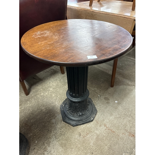 277 - A cast iron and mahogany topped pub table