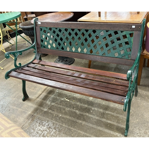 278 - A cast iron and painted pine garden bench