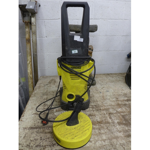 2234 - A Karcher K2 premium pressure washer with hose, lance and patio cleaner attachment