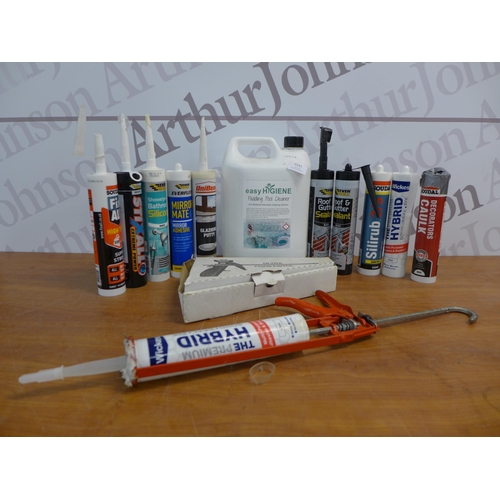 2241 - A box of used/unused sealants, boxed foam gun and a paddling pool cleaner