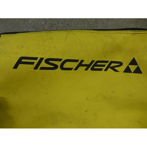 2258 - A set of Fischer M3 Monotop skis in a carry bag