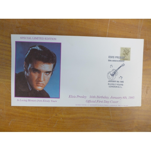 2299 - A crate of Elvis memorabilia including plates, mugs, posters, magazines, watches, wash set and two m... 