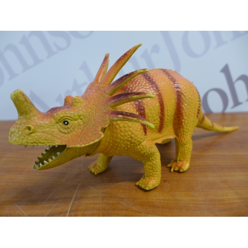 2301 - A selection of plastic dinosaur toys, a Natural History Museum Triceratops guide and a dinosaur stic... 