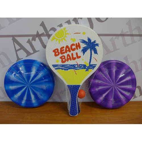 2303 - A crate of various beach/summer toys including frisbees, shuttle ball games, bucket and spade sets, ... 