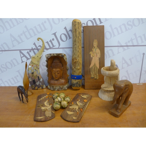 2304 - A crate of wooden carvings, ornaments, pictures, statues and cars