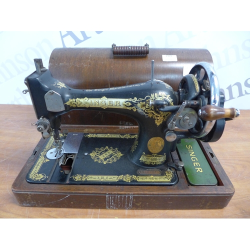 2319 - A Singer model EB604876 manually operated vintage sewing machine