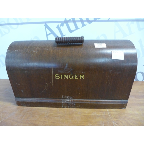 2319 - A Singer model EB604876 manually operated vintage sewing machine