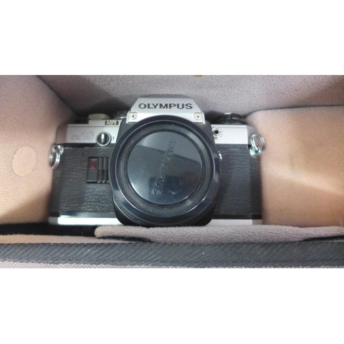 2419 - A quantity of photography equipment including 2 Olympus OM10 cameras and camera bag, a Jessop Skylig... 