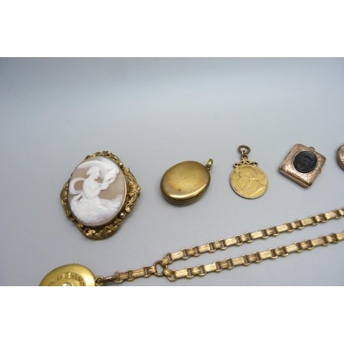 1025 - Vintage jewellery including a carved cameo brooch, three picture pendants, pendant and chain and a c... 