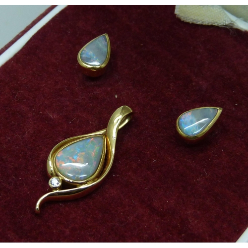 1027 - A pair of 18ct yellow  gold and opal earrings and an 18ct gold, opal and diamond pendant, 4.7g total... 