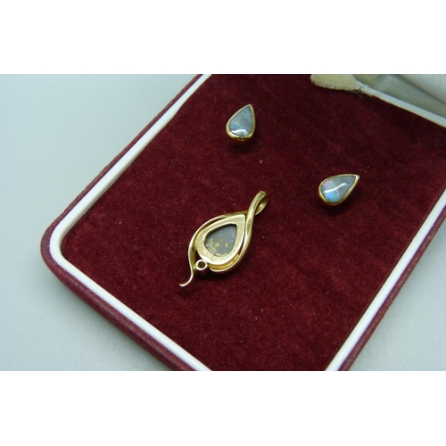 1027 - A pair of 18ct yellow  gold and opal earrings and an 18ct gold, opal and diamond pendant, 4.7g total... 