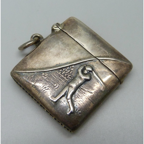 1072 - A silver vesta case with golfing scene