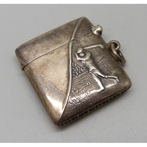 1072 - A silver vesta case with golfing scene