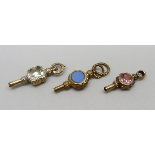 1075 - Three stone set fob watch keys, including carnelian and bloodstone