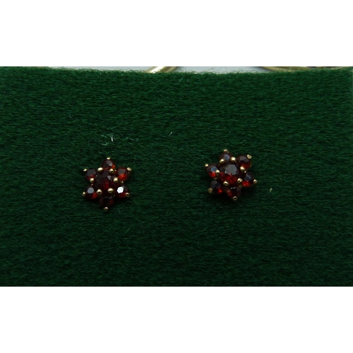 1078 - A pair of 9ct gold and garnet earrings, Pandora bracelet with two charms, silver bangle, etc.