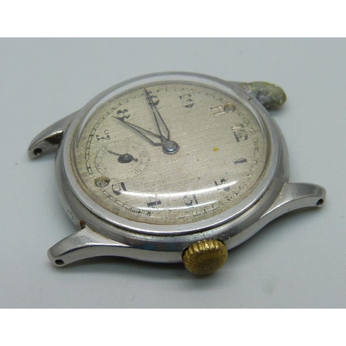 1102 - A Universal Geneve wristwatch head with inscription to case back