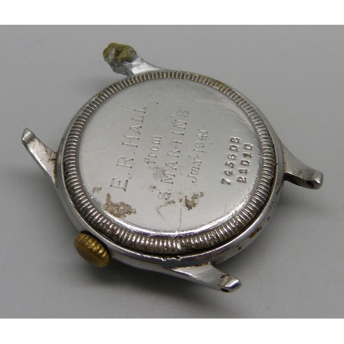 1102 - A Universal Geneve wristwatch head with inscription to case back