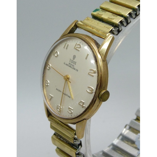 1112 - A 9ct gold cased Tudor Royal wristwatch with long service inscription to case back