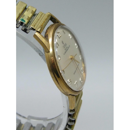 1112 - A 9ct gold cased Tudor Royal wristwatch with long service inscription to case back