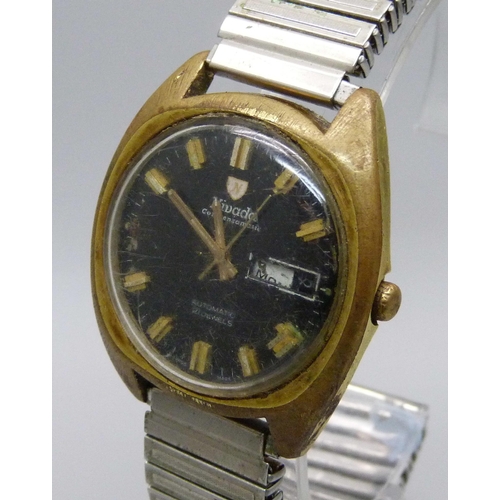 1115 - A Nivada Compensamatic black dial day/date wristwatch with sweep second hand, a/f, date marker loose