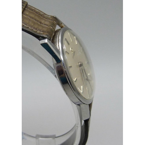 1117 - An Omega stainless steel cased wristwatch, glass scratched