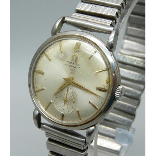 1120 - An Omega stainless steel wristwatch, possibly 1960, with subsidiary second hand (dial slightly stain... 