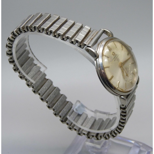 1120 - An Omega stainless steel wristwatch, possibly 1960, with subsidiary second hand (dial slightly stain... 