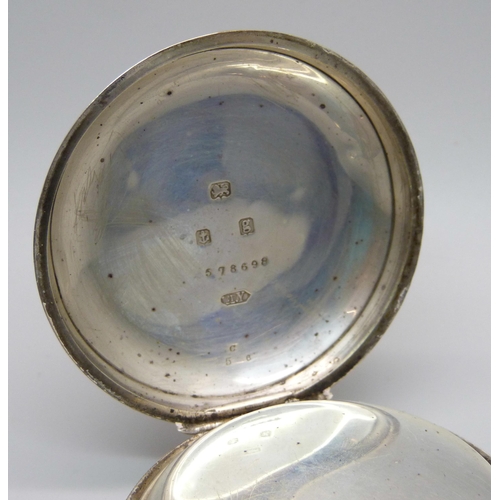 1121 - A large heavy silver cased English lever pocket watch (glass missing)