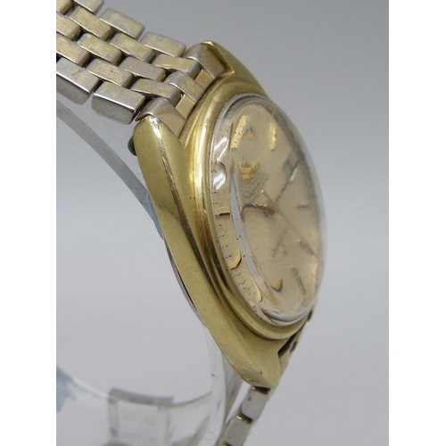 1130 - An Omega Constellation automatic chronometer  wristwatch with date, on original strap