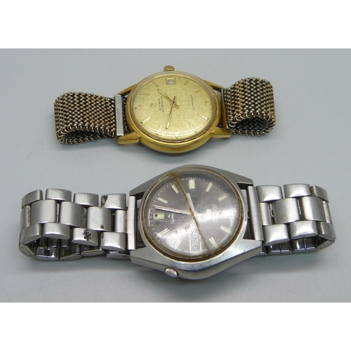 1132 - A Cyma Autorotor date wristwatch and a Seiko automatic day/date wristwatch