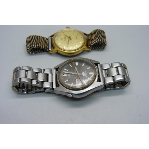 1132 - A Cyma Autorotor date wristwatch and a Seiko automatic day/date wristwatch