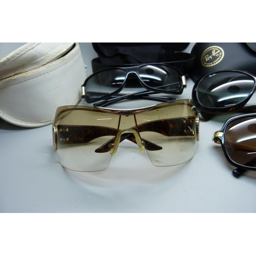 833 - Four pairs of sunglasses, Gucci, Dior, Rayban and Michael Kors