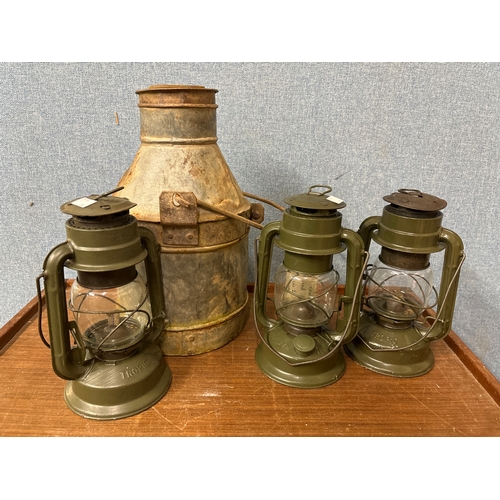 297 - Three Tilley lamps and a galvanised water container