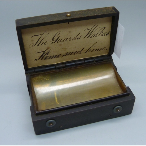 854 - A 19th Century music box, the case marked Mameluck Par Carle Vernet, 96mm wide, a/f, case damaged