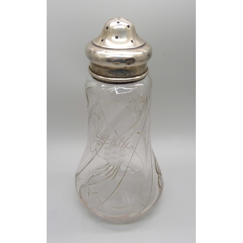 865 - A silver topped glass sugar shaker