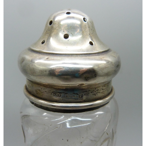 865 - A silver topped glass sugar shaker