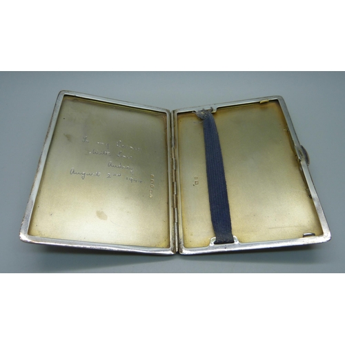 877 - A silver cigarette case, inner case bears inscription dated 1944, 176g, 8cm x 11cm