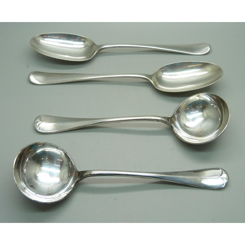 892 - A pair of silver rattail ladles, Sheffield 1907, 206g, and two plated serving spoons