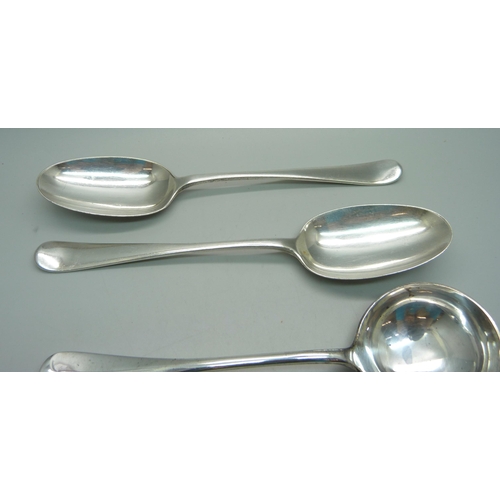 892 - A pair of silver rattail ladles, Sheffield 1907, 206g, and two plated serving spoons