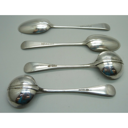 892 - A pair of silver rattail ladles, Sheffield 1907, 206g, and two plated serving spoons