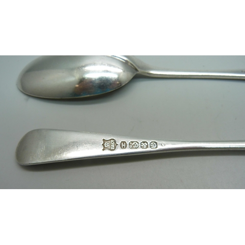 892 - A pair of silver rattail ladles, Sheffield 1907, 206g, and two plated serving spoons