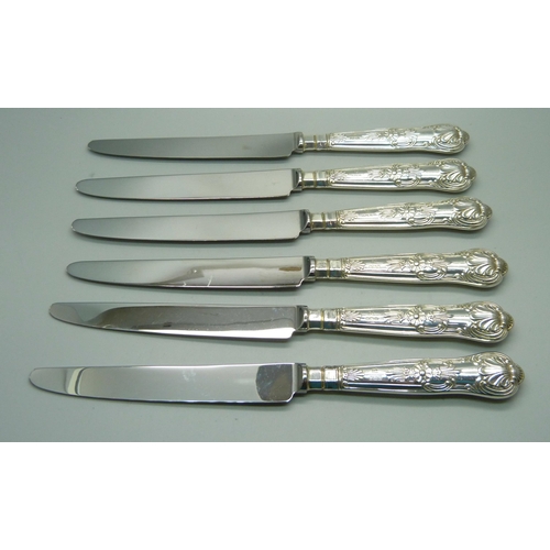 894 - A set of six Queens pattern table knives, Sheffield silver mark on handles