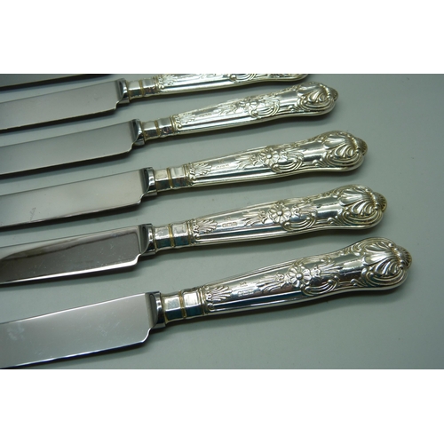 894 - A set of six Queens pattern table knives, Sheffield silver mark on handles