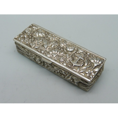 898 - A silver pill box with gilt interior and the lid with lion, rose and anchor detail, London import ma... 