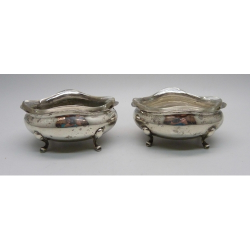 900 - A pair of silver salts with glass liners, 74.9g of silver, Birmingham 1897