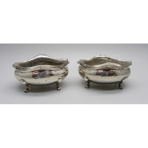 900 - A pair of silver salts with glass liners, 74.9g of silver, Birmingham 1897