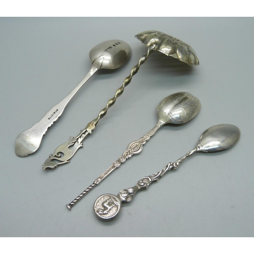 903 - A silver sifter ladle with stork finial and three other silver spoons, 57g