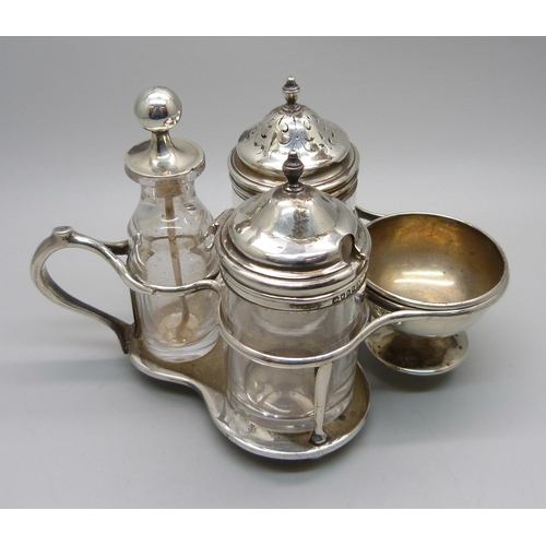 904 - A Victorian silver cruet stand, Hunt & Roskell (late Storr & Mortimer), London 1868, 113g, with four... 