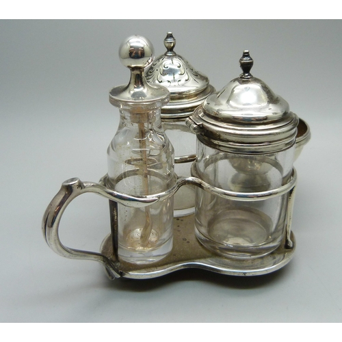 904 - A Victorian silver cruet stand, Hunt & Roskell (late Storr & Mortimer), London 1868, 113g, with four... 