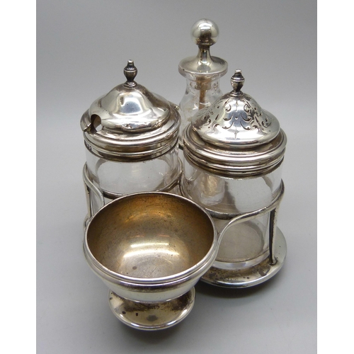 904 - A Victorian silver cruet stand, Hunt & Roskell (late Storr & Mortimer), London 1868, 113g, with four... 